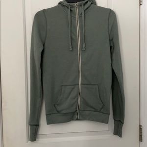 green zip up